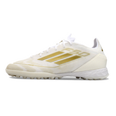 Chuteira Society TF Adidas F50 Elite Branca e Dourada