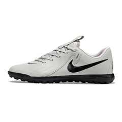 Chuteira Society TF Nike Phantom GX2 Academy Pack Rising Gem