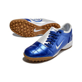 Chuteira Society TF Nike Total 90 III Branca e Azul Infantil