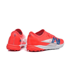 Chuteira Society TF New Balance Furon V8 Elite Rosa e Prateada