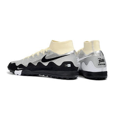 Chuteira Society TF Nike x Patta Zoom Mercurial Superfly Elite Branco, Preto e Prateado
