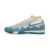 Chuteira Society TF Nike x Patta Zoom Mercurial Superfly Elite Branco, Azul e Prateado Kids