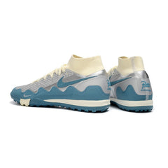 Chuteira Society TF Nike x Patta Zoom Mercurial Superfly Elite Branco, Azul e Prateado Kids