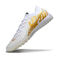 Chuteira Society TF Nike Phantom GX2 Elite Branca e Dourada
