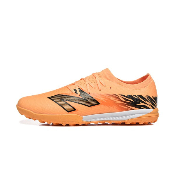 Chuteira Society TF New Balance Furon V8 Elite Laranja