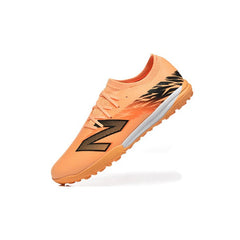 Chuteira Society TF New Balance Furon V8 Elite Laranja