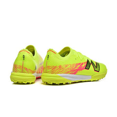 Chuteira Society TF New Balance Furon V8 Elite Amarela e Rosa