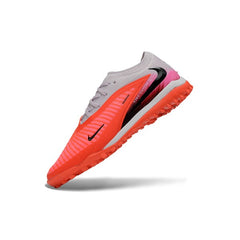 Chuteira Society TF Nike Phantom 6 Elite Laranja, Branco e Rosa